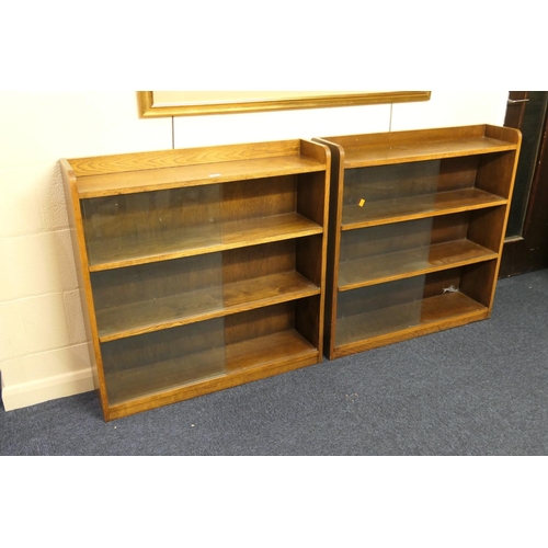 592 - Pair of oak bookcases with glazed sliding doors, each 91cm x 92cm