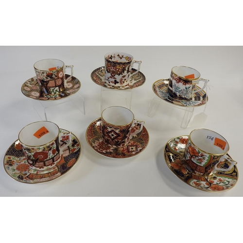 158 - Six Royal Crown Derby coffee cups and saucers from the Curator's Collection