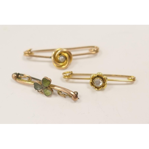 312 - 10ct gold moonstone set bar brooch and two 9ct gold stone set bar brooches (3), gross weight approxi... 