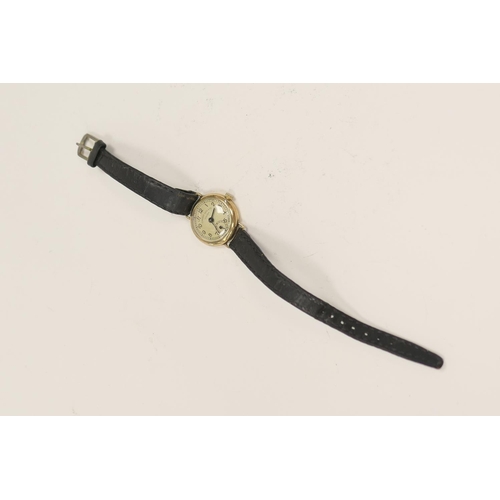 323 - Camerer Cuss & Co., London lady's vintage 9ct gold cased wristwatch on leather strap