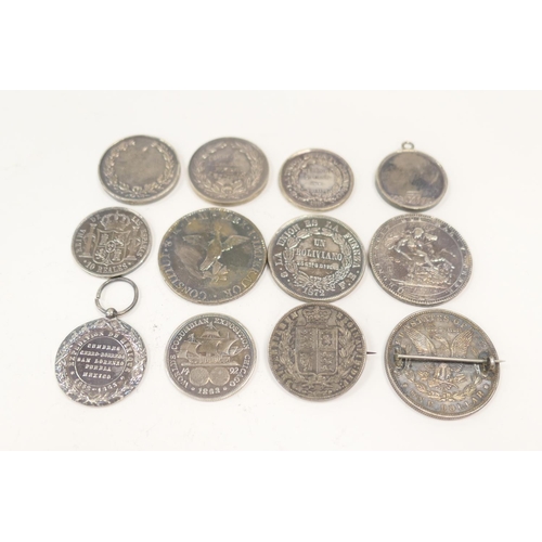 324 - George III silver crown, 1819 (F), two HMS Conway silver racing medallions, Columbian and Bolivian c... 