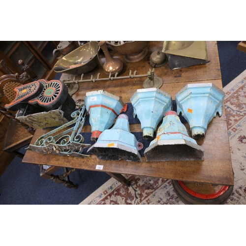 557 - Six cast iron rain hoppers, two wrought metal hanging basket brackets and a Victorian painted cast i... 