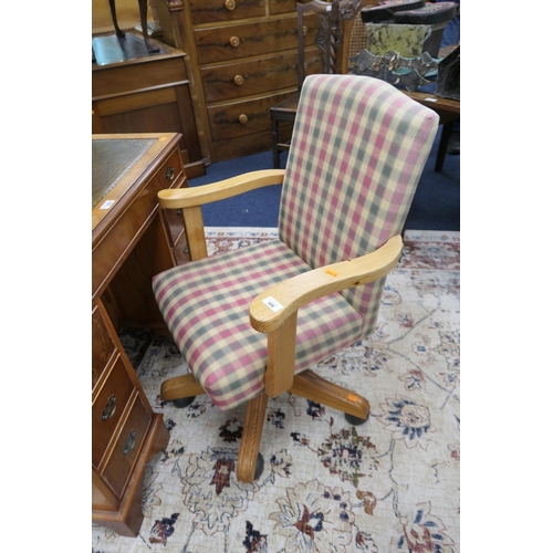 558 - Modern pine framed and upholstered swivel armchair