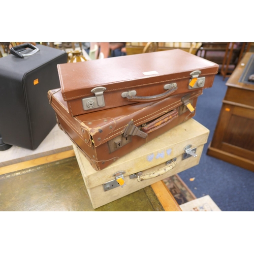 560 - Small vellum suitcase, Masonic apron case and a further suitcase (3)