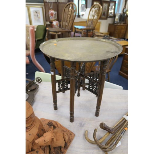 569 - North African brass tray topped folding table