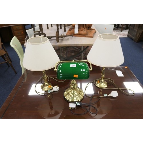 574 - Modern brass and green glass desk lamp; also a pair of modern brass table lamps (3)