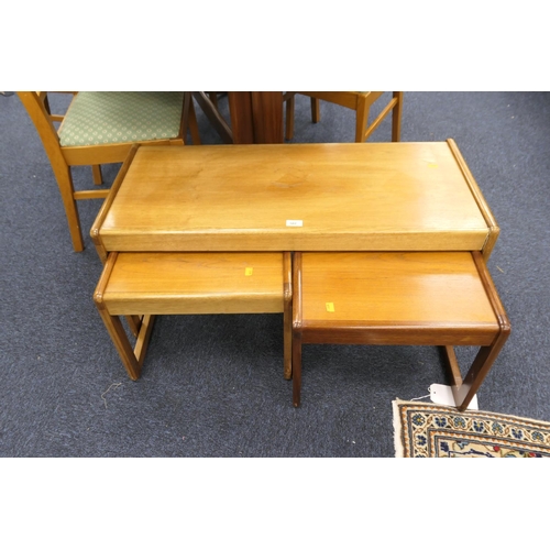 582 - Retro nest of teak tables, the largest 96cm