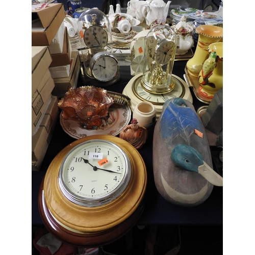 118 - Assorted clocks including anniversary and wall clock, also a carved wooden decoy style duck, carniva... 