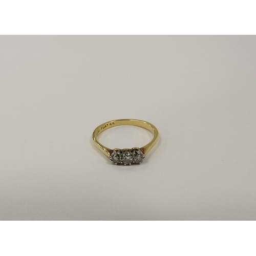 318 - Diamond three stone ring, in 18ct gold and platinum, total diamond weight approx. 0.44ct, size L, gr... 