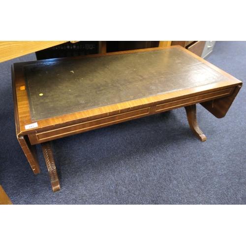 543 - Mahogany leather topped drop leaf coffee table