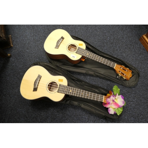 554 - Two modern ukuleles