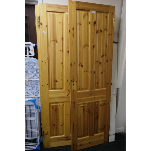 612 - Pair of solid pine panelled doors, 196.5cm x 61cm x 3.5cm, also a pair of solid pine panelled doors,... 