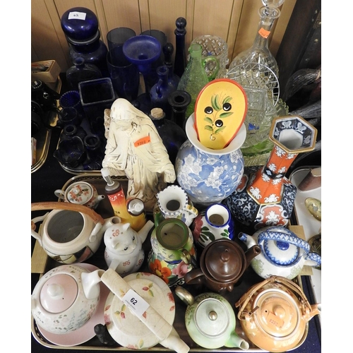 62 - Assorted decorative glassware and ceramics including blue glass, ornamental teapots etc. (2 trays)