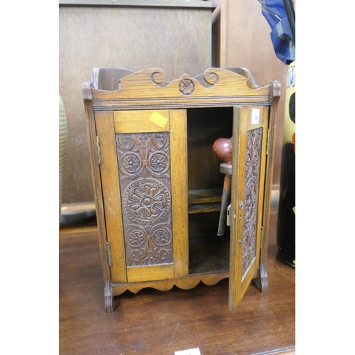 505 - Victorian oak smoker's cabinet with two briar pipes, width 32.5cm