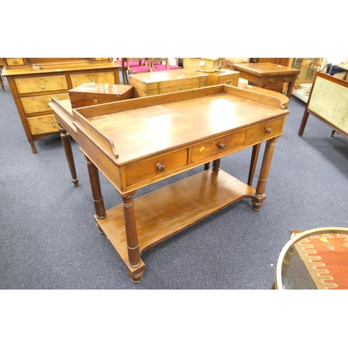 597 - Good Victorian mahogany washstand, circa 1860, fitted with three drawers on column supports, width 1... 