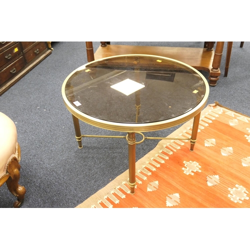 598 - Modern brass and smoked glass topped circular table, width 70cm