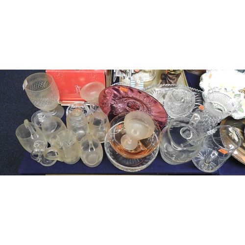 104 - Mixed glassware including a vase, water jugs, fruit bowls, cut glass tankards and a cranberry cut gl... 