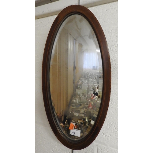 66 - Edwardian mahogany and inlaid oval framed wall mirror