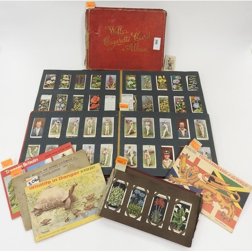 306 - Number of cigarette card albums and tea card albums