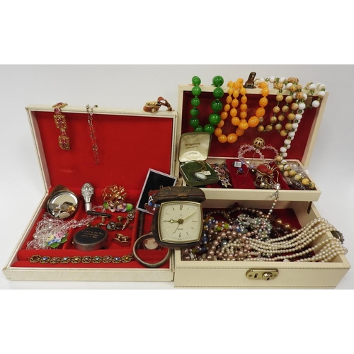 312 - Cream coloured jewellery box with assorted decorative jewellery contents and a further cream coloure... 