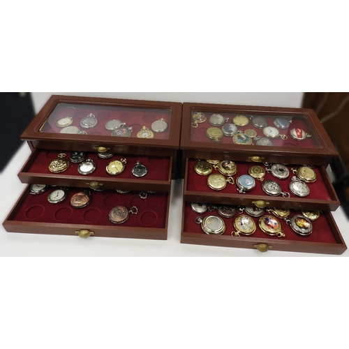 313 - Collectors' pocket watch cabinet containing an assortment of decorative pocket watches