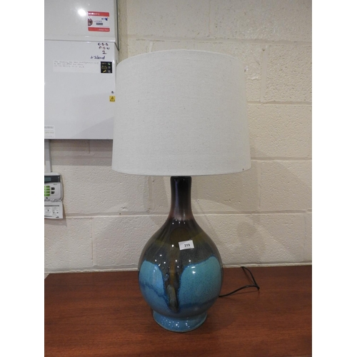 319 - Decorative blue and ochre glazed bottle lamp