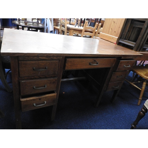 419 - George V oak kneehole office table, width 139cm, depth 77cm