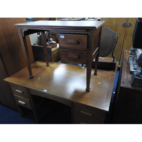 427 - Oak small kneehole table, width 91cm; also a further oak kneehole office desk, width 137cm, depth 76... 