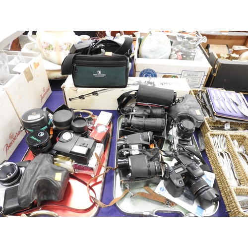 107 - Mixed cameras and binoculars including a Canon AE1 35mm, Mamiya/Sekor 500 TL 35mm camera, Konica Min... 