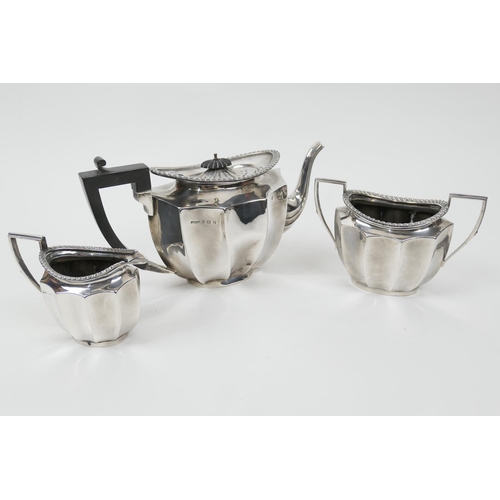 115 - George V silver three piece tea service, maker FHA & Co., Birmingham 1925/6, comprising lidded teapo... 