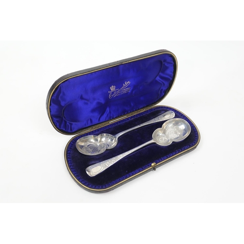 118 - Pair of late Victorian engraved silver fruit spoons, maker GJ/DF, London 1899, engraved throughout w... 