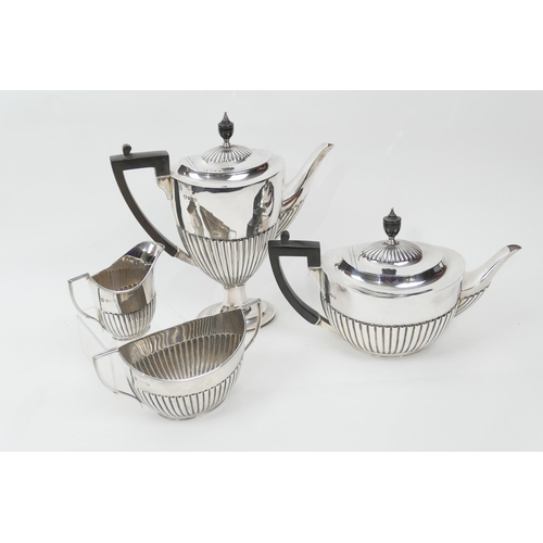 127 - Silver composite four piece tea and coffee service, comprising teapot, sugar basin and milk jug by W... 