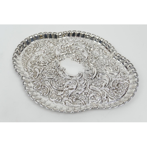 171 - Edwardian silver dressing table tray, by Synyer & Beddoes, Chester 1905, lobed oval form repousse de... 