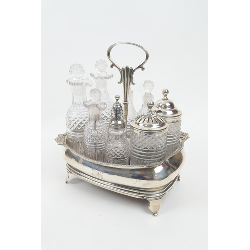 178 - George III silver eight bottle cruet, maker indistinct, London 1810, the base of shallow baluster fo... 