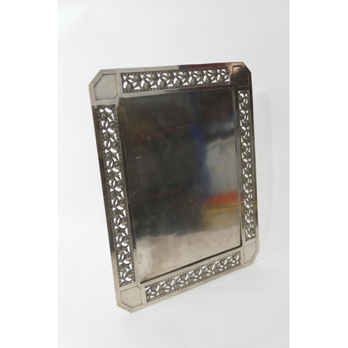 180 - Secessionist style silver plated table frame, circa 1920-30, canted rectangular form, the pierced bo... 