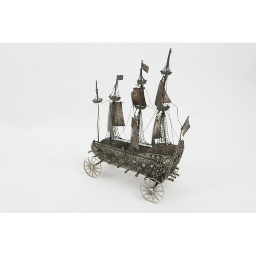 183 - Continental white metal filigree nef, traditional galleon form, length 16cm