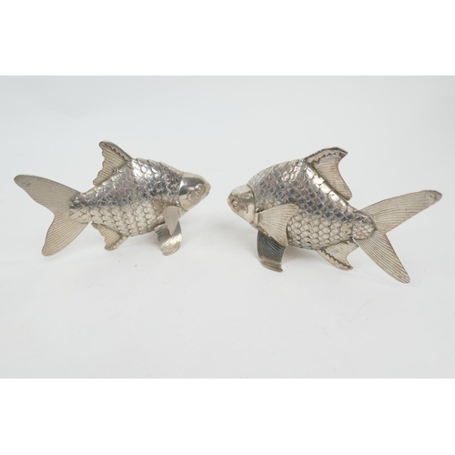 218 - Pair of continental white metal goldfish ornaments, 12.5cm