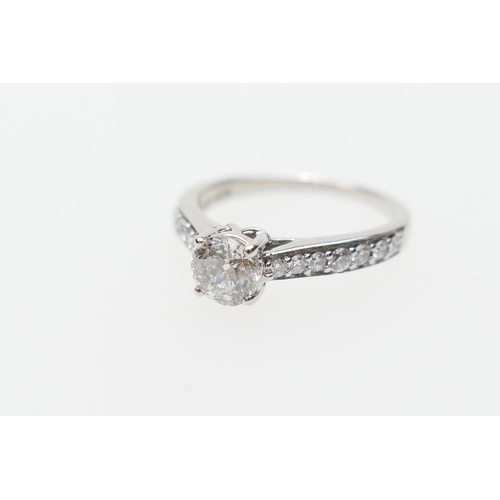 350 - Certificated diamond ring, circa 2014, centred with a round modified brilliant diamond with 73 facet... 