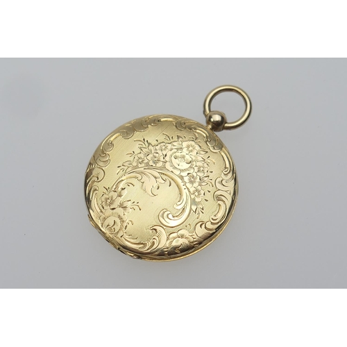 360 - Victorian gold foliate chased picture locket, circular form with button opening, 29mm diameter, with... 