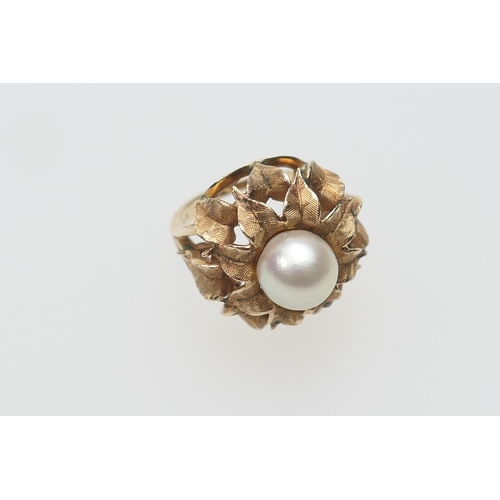 384 - 14ct gold cultured pearl 'sunflower' ring, 9mm diameter pearl bordered with two rows of chased overl... 