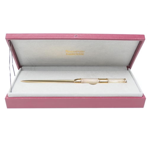 387 - Nazareno Gabrielli sterling silver and gold plated paper knife, in original presentation box, 18.5cm