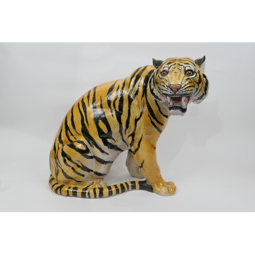 42 - Large Italian terracotta model of a tiger, late 20th Century, hand decorated throughout, height 49cm