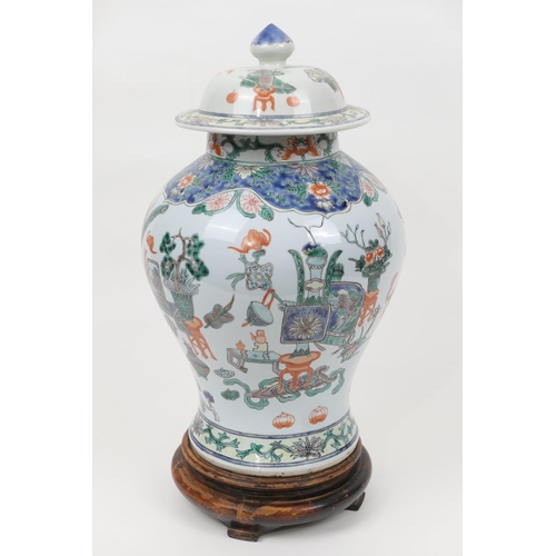 43 - Chinese famille verte baluster jar and cover, 20th Century, decorated with precious objects in predo... 