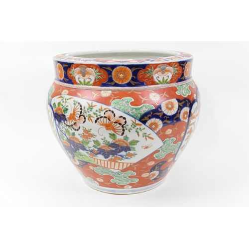 63 - Japanese Imari porcelain jardiniere, late Meiji (1868-1912), decorated with panels of waterfowl in a... 