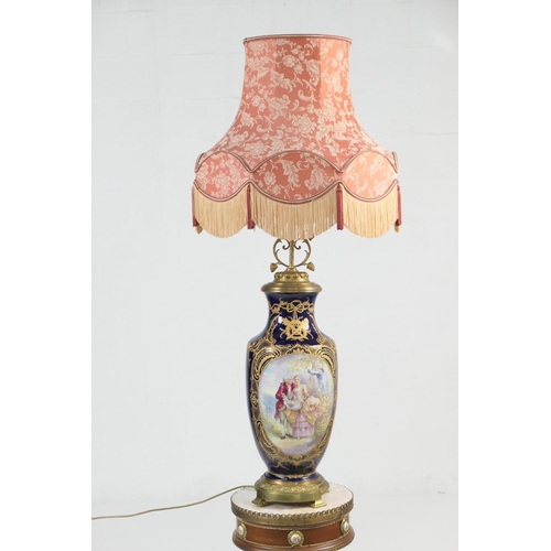 653 - Sevres style hand decorated porcelain vase lamp, with brass mounts and decorated with gilded panels ... 