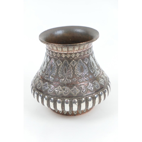 691 - Cario ware small baluster vase, circa 1900, with silver inlaid decoration, height 10cm