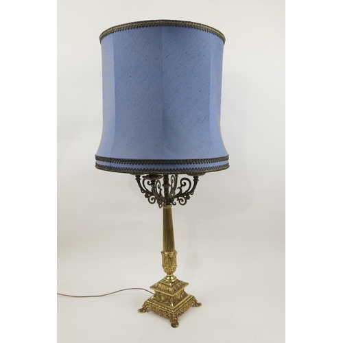 692 - Decorative gilt brass table lamp, late 20th Century, with four candle branches centred with an elect... 