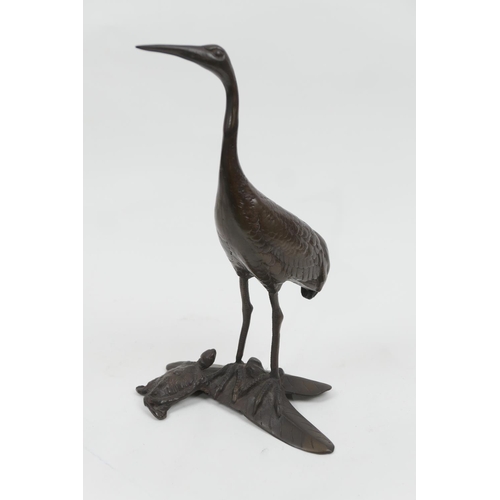 696 - Japanese bronze stork and turtle okimono, Taisho (1912-26), height 28cm