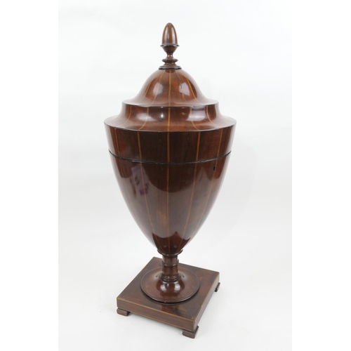 697 - George III mahogany and inlaid urn shaped knife box converted to a decanter box, containing three gr... 