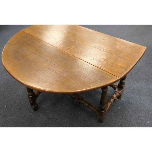 872 - 18th Century oak gateleg table, two drop leaves over single turned and ringed gates and similar stre... 